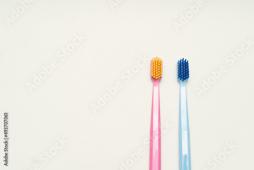 A conceptual of a couple toothbrush in love. Toothbrushes convey the human relationship between a man and a woman. © Wongsakorn