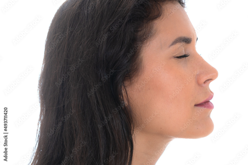 Profile portrait of a beautiful woman isolated on a white background Profile portrait of a beautiful woman isolated on a white background