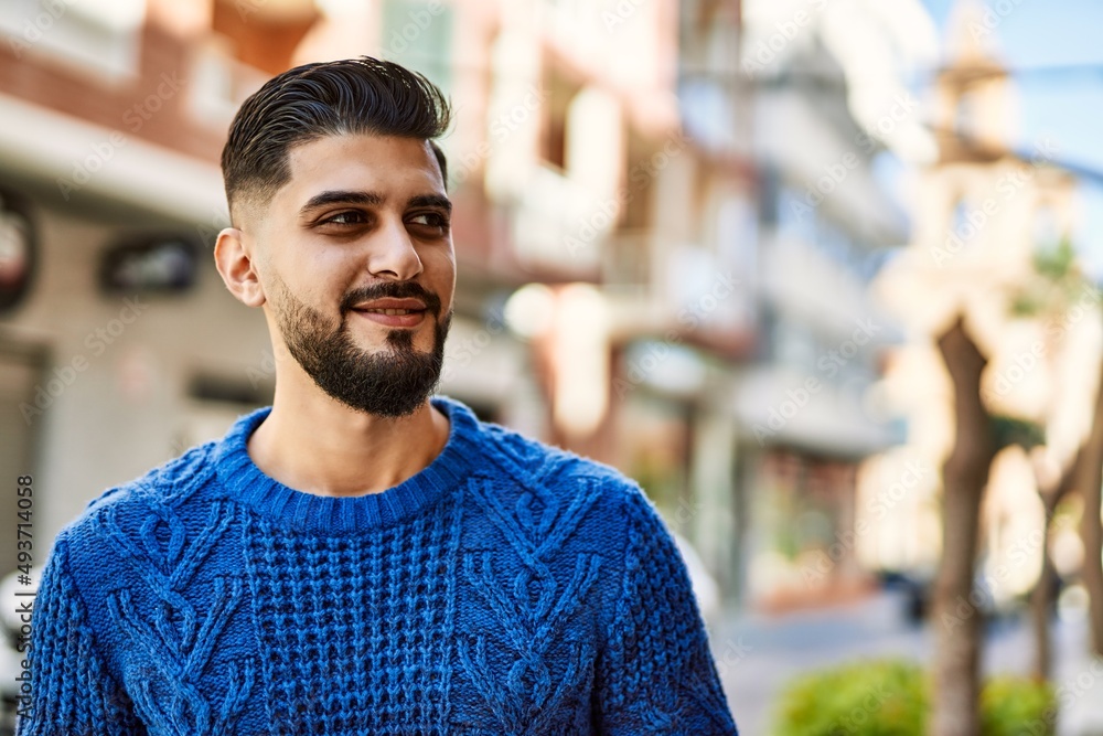 Young arab man smiling confident at street Young arab man smiling confident at street