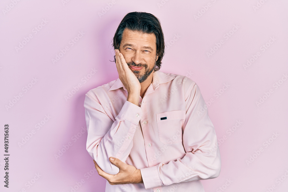 Middle age caucasian man wearing casual clothes thinking looking tired and bored with depression problems with crossed arms. Middle age caucasian man wearing casual clothes thinking looking tired and bored with depression problems with crossed arms.