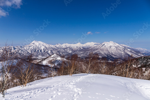 飯縄山から雪の妙高戸隠連山を臨む © Umibozze