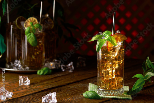 Billede på lærred Glass of long island ice tea cocktail decorated with mint