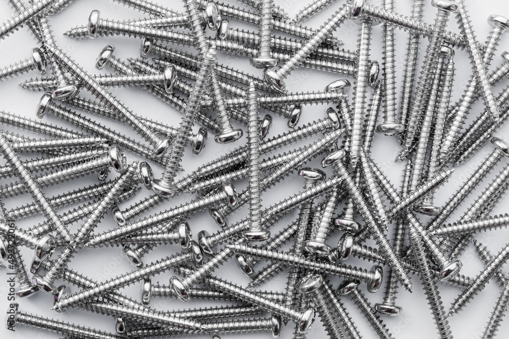 Nuts Bolts Screws nail closeup on white background Nuts Bolts Screws nail closeup on white background
