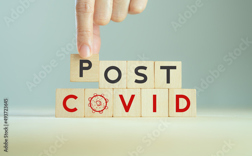 Post covid concept. Hope and the end. Long covid; long-term effects of coronavirus. Chronic fatigue, feeling tired easily. Medical, treatment long covid symstoms, recovery tips..Wooden cube blocks.