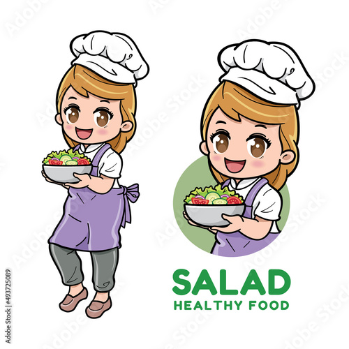 Cute female chef holding a bowl of salad.