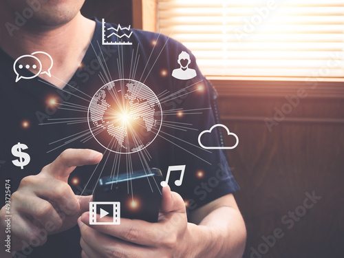 man using a smartphone to search for information on the Internet, IOT Internet of Things, business concepts, global connection technology, big data, online marketing, cloud services on mobile phone