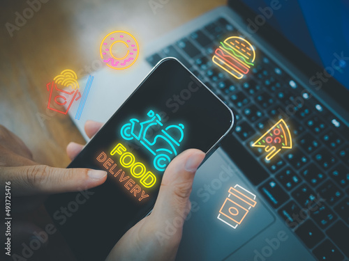 Customer click to order food by application on smartphones, food delivery with Mobile application concept, work from home, home isolation, home quarantine
