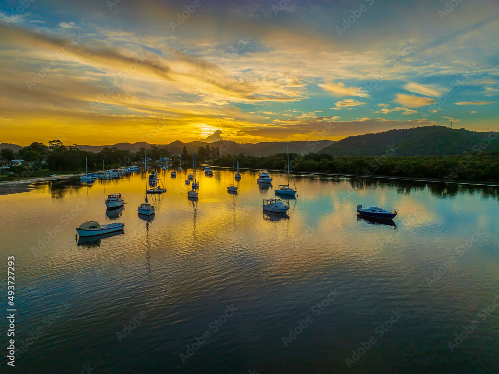 Fototapeta premium Early evening flight over the bay