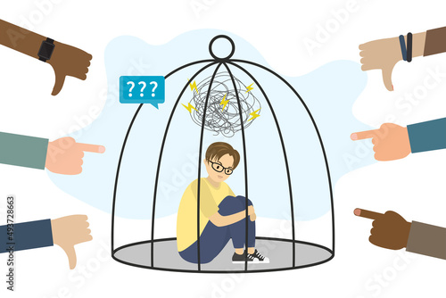 Classmates point fingers at schoolboy and poison his. Concept of bullying, violence at school. Unhappy boy sitting in cage, mental problems, stress. Conflict between people.