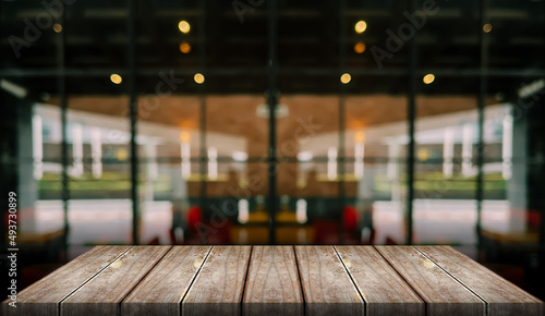 Wallpaper Mural Empty wooden table top with lights bokeh on blur restaurant background. Torontodigital.ca