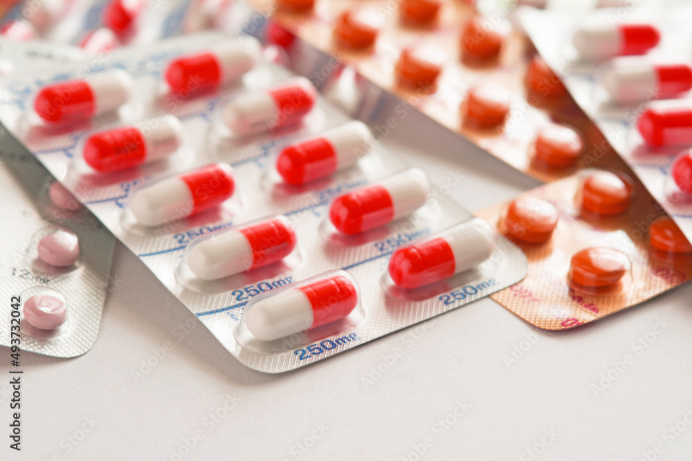 Various pills on a white background Various pills on a white background
