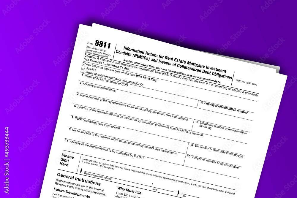 Form 8811 documentation published IRS USA 09.18.2013. American tax document on colored Form 8811 documentation published IRS USA 09.18.2013. American tax document on colored
