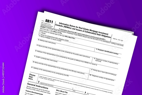 Form 8811 documentation published IRS USA 09.18.2013. American tax document on colored © dmitriy