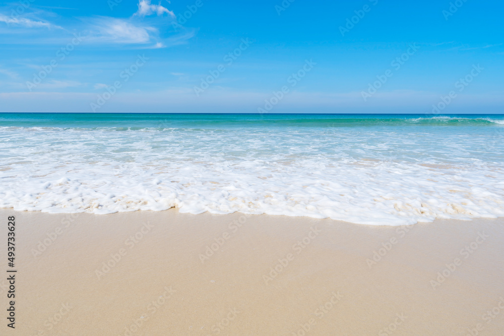 Phuket sea Beautiful tropical sandy beach with blue ocean and blue sky background image for nature background or summer background
