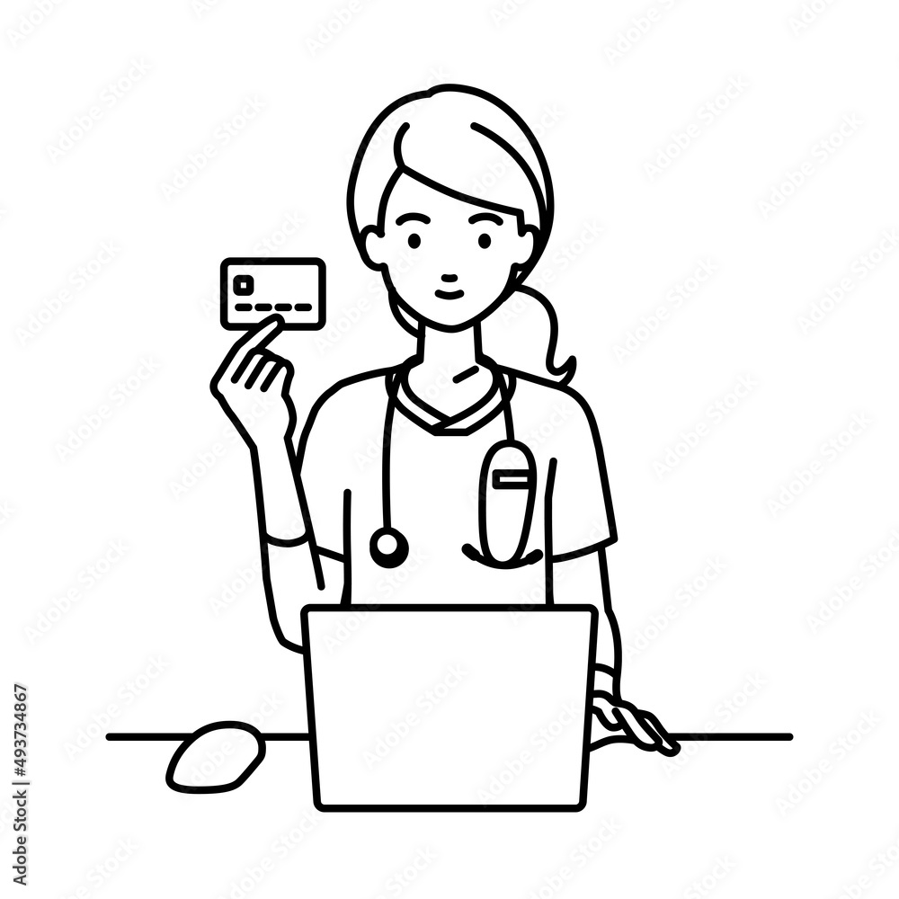 デスクで座ってPCを使いながらクレジットカードを手に持っている看護師の女性