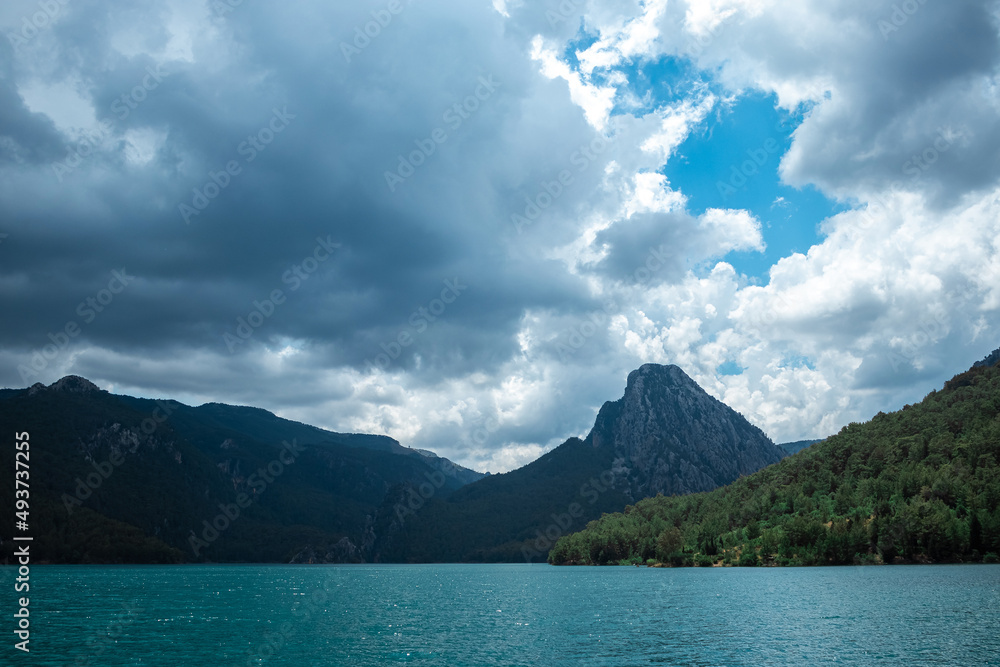 Popular tourist attraction. beautiful nature view with fjord and mountains in the water. Artistic nature, copy space.