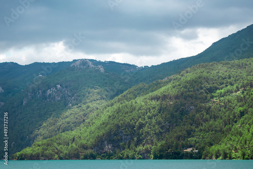 Popular tourist attraction. beautiful nature view with fjord and mountains in the water. Artistic nature, copy space.