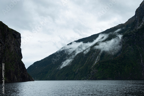 Clouds drifting over the mountains at Milford Sound  South Island