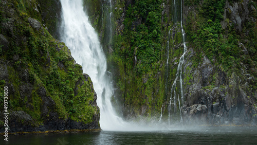 Stirling Falls plunging vertically into Milford Sound  South Island  New Zealand