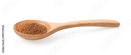 Brown Teff Grain in wood spoon on white