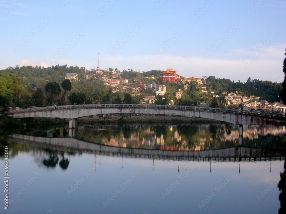 The small hill town mirrored at Sumendu Lake look mesmserizing at Mirik in Darjeeling. This is an old artificial lake measuring around 1.25 km long and main attraction of the place.