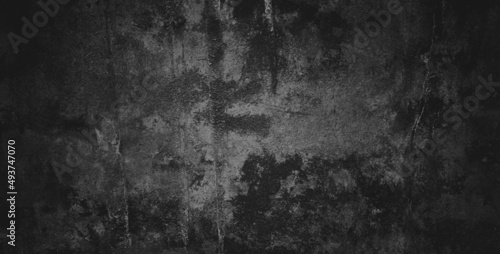 Black dark grunge background and texture of black concrete wall. © Background Studio