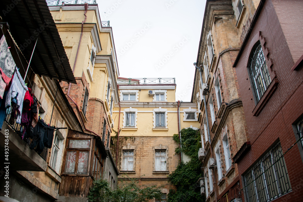 Odessa, Ukraine - November 28, 2020: old cozy courtyard in Odessa Odessa, Ukraine - November 28, 2020: old cozy courtyard in Odessa