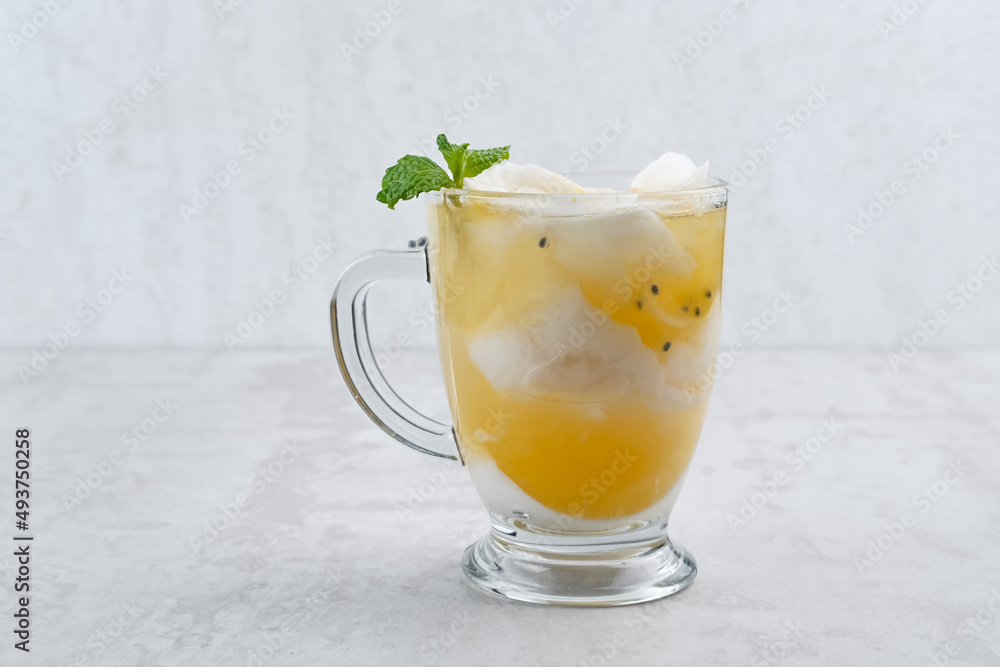 Es Kelapa Jeruk, a typical Indonesian drink made from fresh oranges squeezed with grated young coconut.
Es Kelapa Jeruk, a typical Indonesian drink made from fresh oranges squeezed with grated young coconut.
