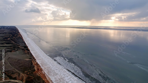 photo from a bird's eye view. Landscape of canyons and the sea shot from a drone.