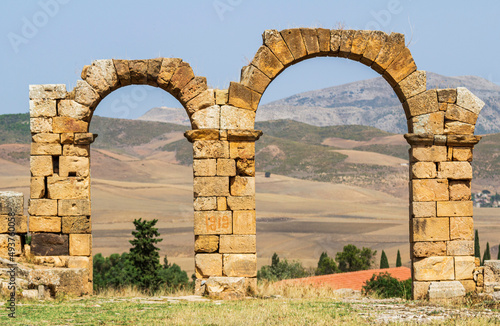 Arcs from the Roman ruins of Khemissa in SoukAhras province of Algeria. photo