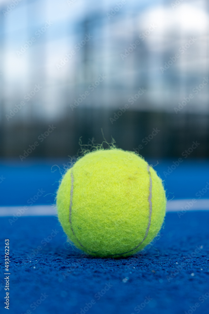 Selective focus.Bright blue tennis, paddle ball or pickleball court close up of service line outdoors.