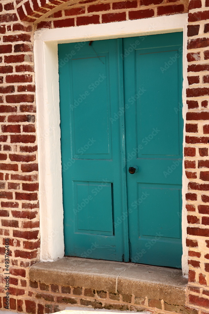 Turquoise Door, Historic Building, Old Brick Wall Turquoise Door, Historic Building, Old Brick Wall