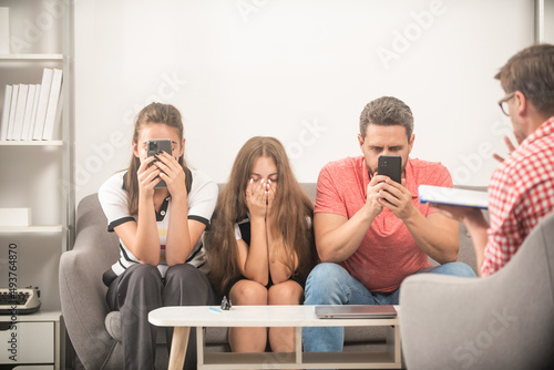 psychologist give family therapy for phone addicted dad mom and daughter girl, addiction