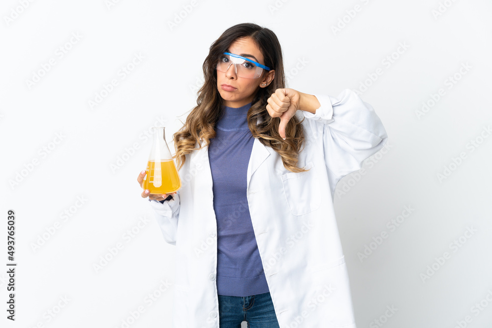 Young scientific woman isolated on white background showing thumb down with negative expression Young scientific woman isolated on white background showing thumb down with negative expression