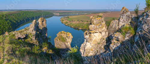 Ukraine without Russian Aggression. Amazing spring view on the Dnister River Canyon with picturesque rocks, fields, flowers. This place named Shyshkovi Gorby,  Nahoriany, Chernivtsi region, Ukraine. photo