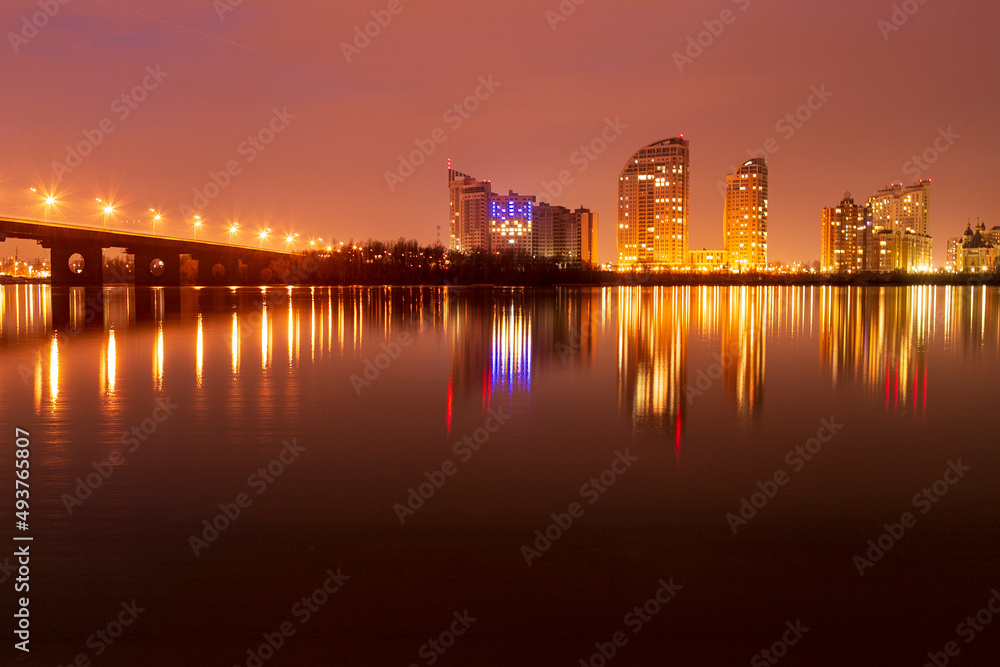 The Southern Bridge across the Dnieper in Kiev, the capital of Ukraine. Blue hour, sunset