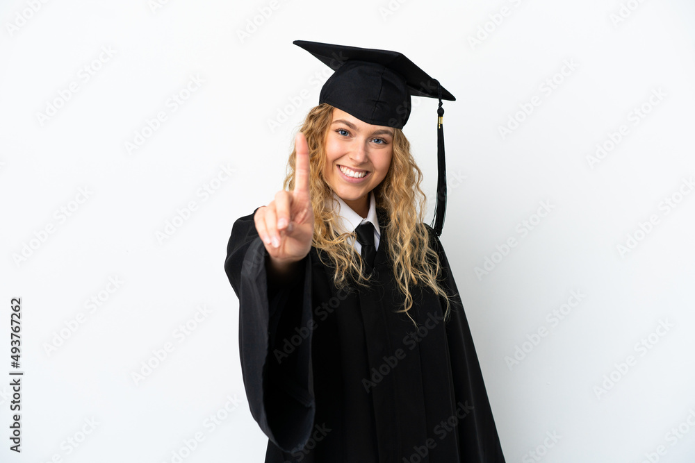 Young university graduate isolated on white background showing and lifting a finger Young university graduate isolated on white background showing and lifting a finger