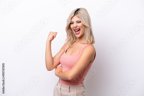 Young Russian woman isolated on white background celebrating a victory