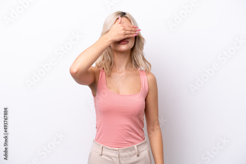 Young Russian woman isolated on white background covering eyes by hands. Do not want to see something