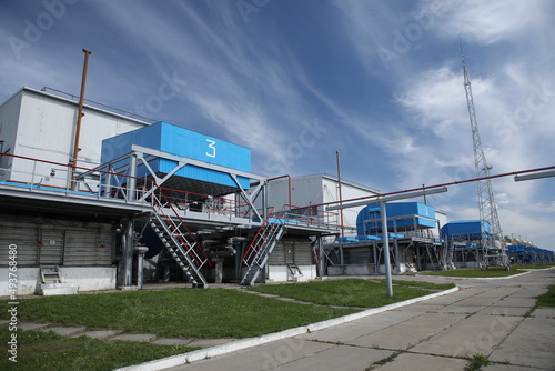 Gas transportation system. Booster pumping station for gas. Gas filling station and gas tanks. Transportation of gas around the world. Oil and gas sector. Gas turbines.