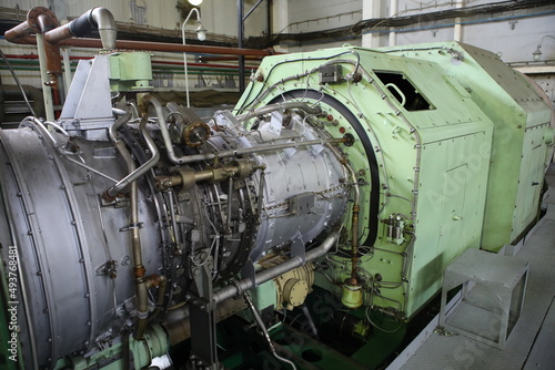 Gas transportation system. Booster pumping station for gas. Gas filling station and gas tanks. Transportation of gas around the world. Oil and gas sector. Gas turbines.