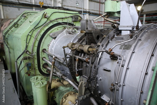 Gas transportation system. Booster pumping station for gas. Gas filling station and gas tanks. Transportation of gas around the world. Oil and gas sector. Gas turbines.