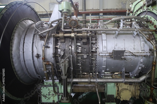 Gas transportation system. Booster pumping station for gas. Gas filling station and gas tanks. Transportation of gas around the world. Oil and gas sector. Gas turbines.