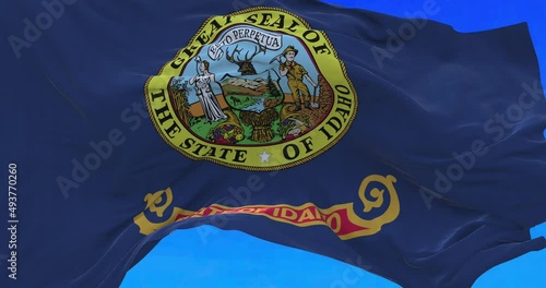 Amazing waving flag of Idaho state. photo