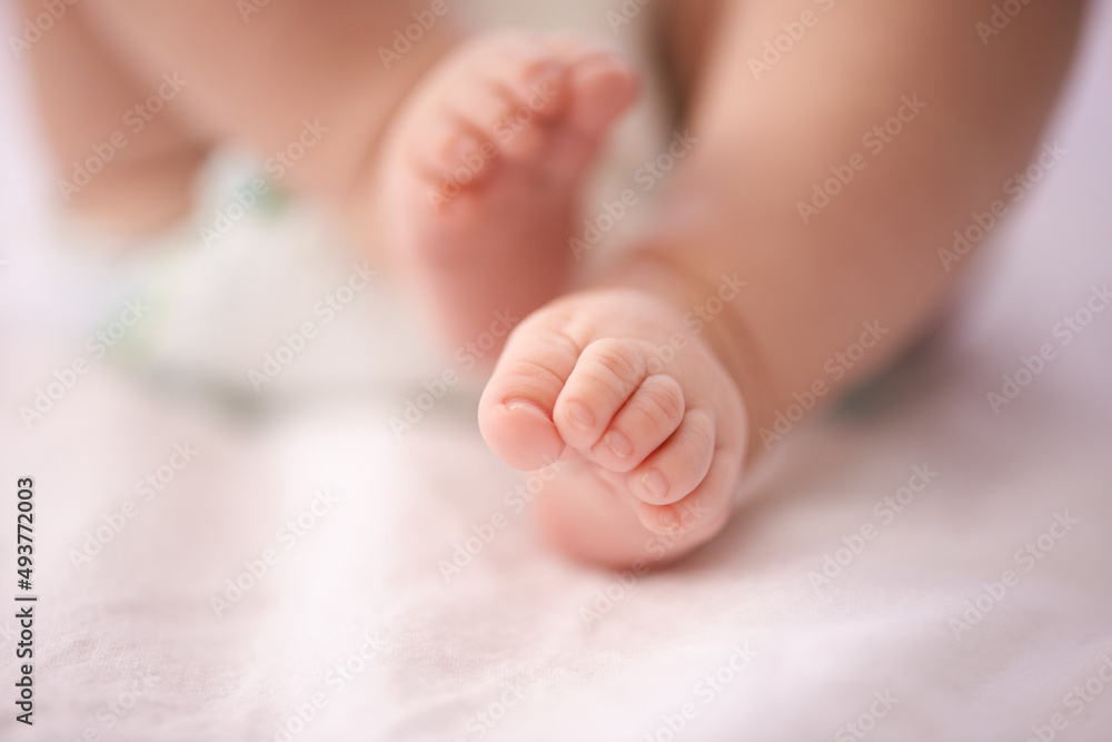Tiny toes. A cropped shot of a babys feet. Tiny toes. A cropped shot of a babys feet.