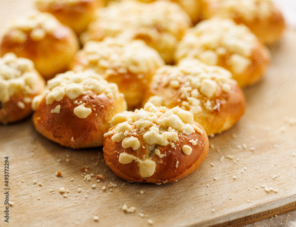 Homemade sweet yeast rolls with butter crumble, close-up view Stock