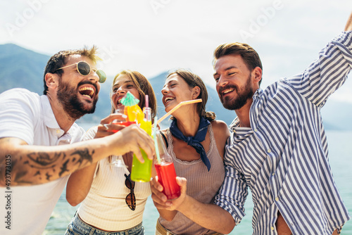 Young people having fun in summer vacation - Travel, friendship, holidays and youth lifestyle concept