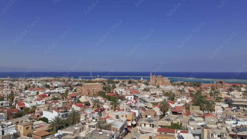 Aerial 4k Famagusta Walled City, old town and Varosha landscapes in North Cyprus surrounded with old streets, shops, touristic sightseeings, mosque, cathedral, castle with a sunny day in Cyprus. Aerial 4k Famagusta Walled City, old town and Varosha landscapes in North Cyprus surrounded with old streets, shops, touristic sightseeings, mosque, cathedral, castle with a sunny day in Cyprus.