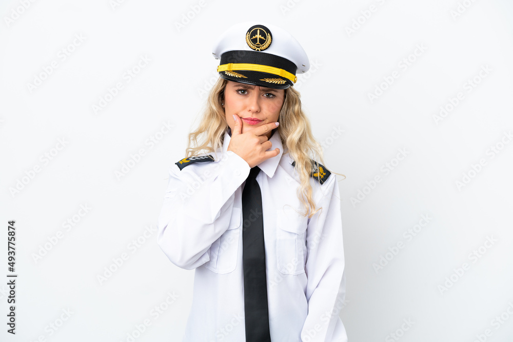 Airplane Brazilian pilot isolated on white background thinking Airplane Brazilian pilot isolated on white background thinking