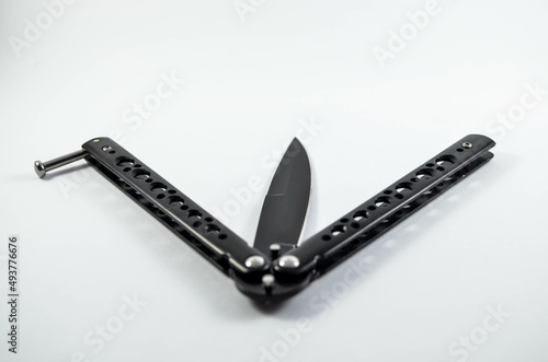 Matte Black Butterfly Knife On The White Background